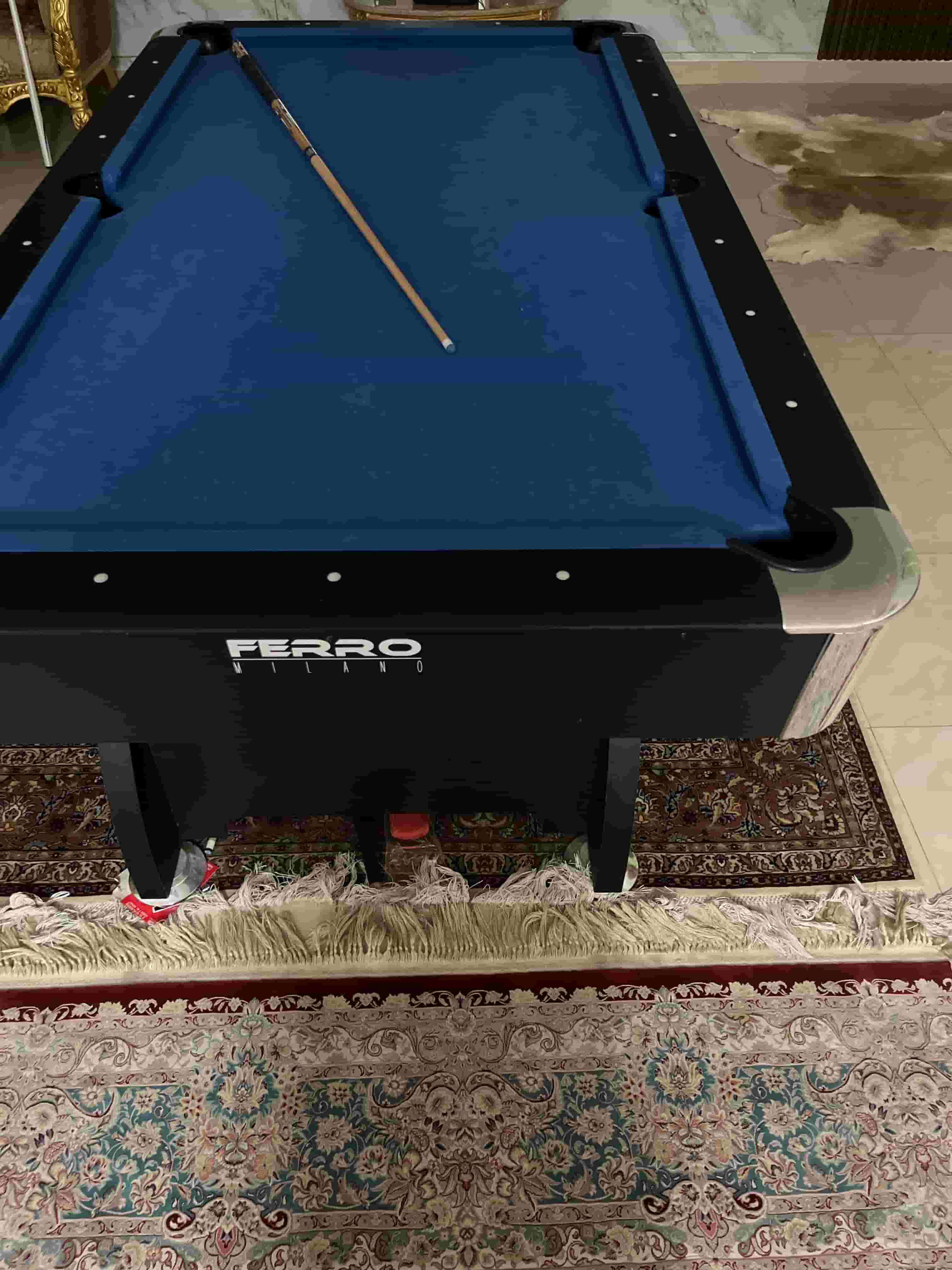 Billiard table, curler and stick